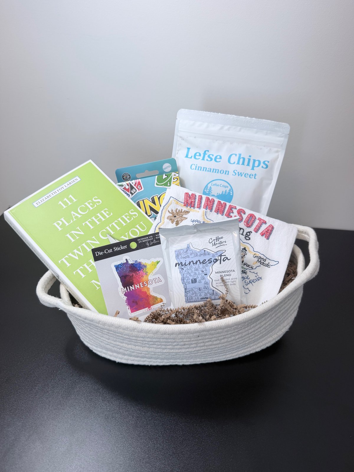 Minnesota-themed realtor closing gift basket with local coffee, lefse chips, a Twin Cities guidebook, and Minnesota keepsakes